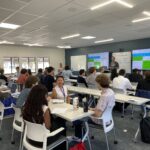 Students discussing topics at the HEDS Summer School August 2025
