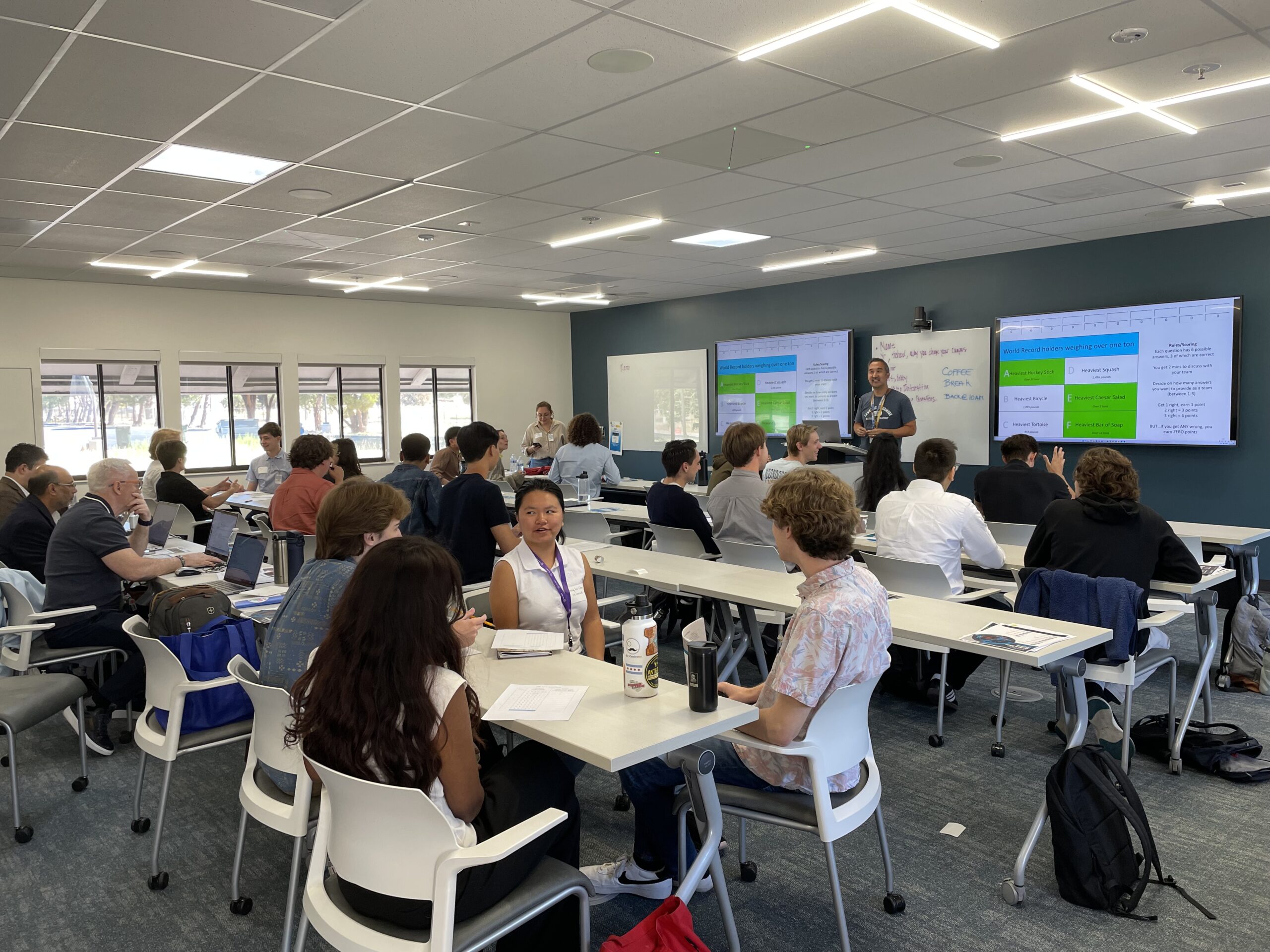Students discussing topics at the HEDS Summer School August 2025