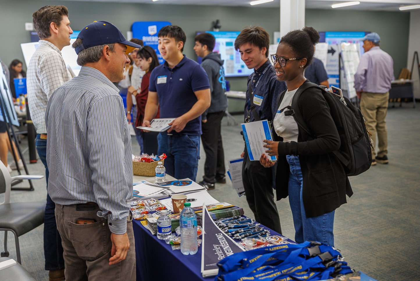 Students and faculty discussing graduate school opportunities